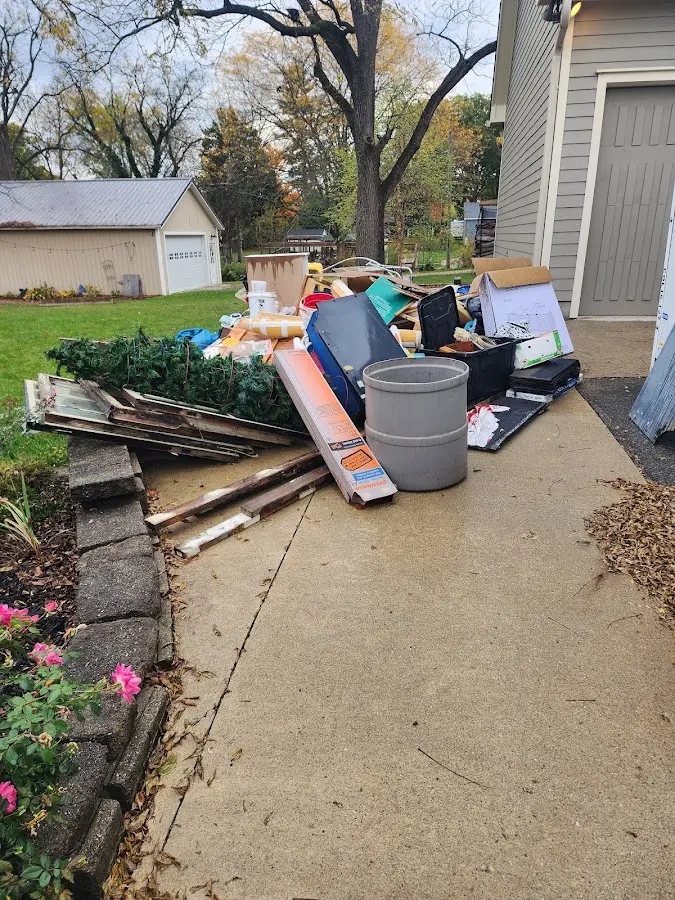 Dumpster being loaded with debris for 3 Yard Dumpster Rental in North Charleston